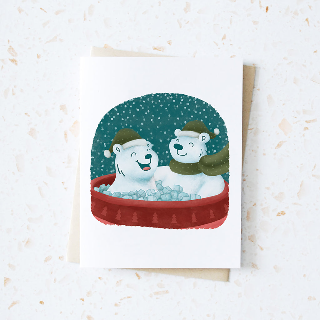 Cheeky pair of polar bears enjoying a little ice bath for the holidays